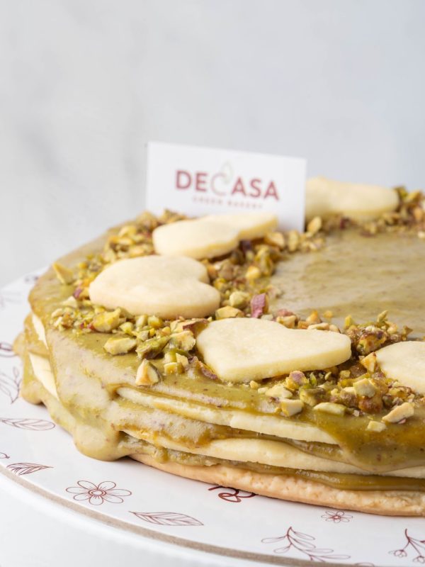 Torta alfajor de pistachos vegana